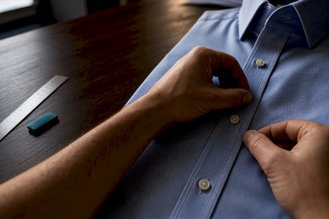 Tailor marking shirt monogram placement