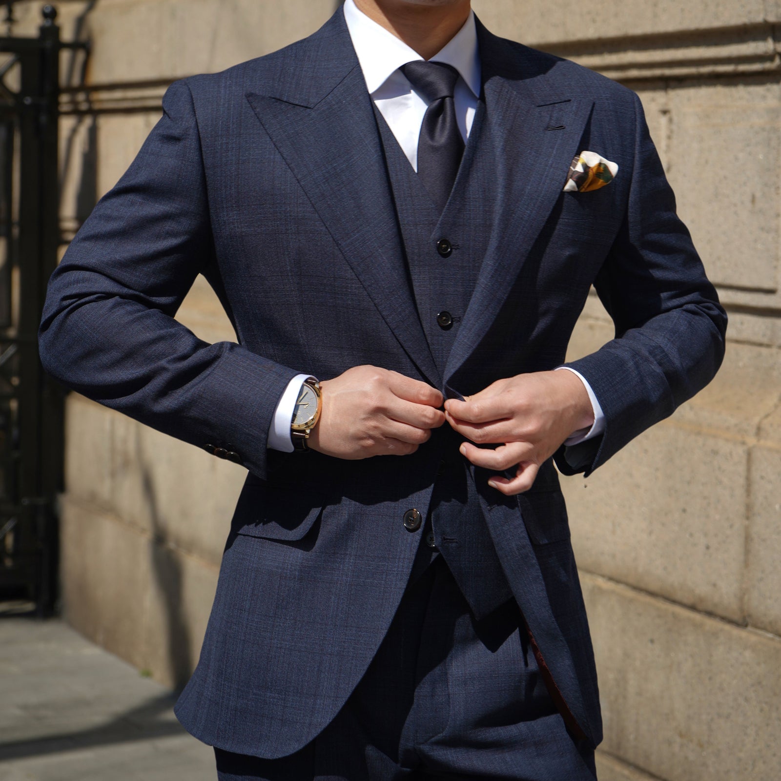 Navy three-piece bespoke suit with waistcoat